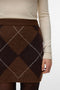 Front image of a model wearing the Darla nw short skirt in brown, by brand Vero moda
