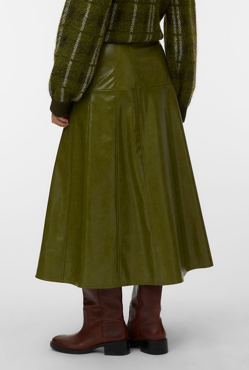 Back image of a model wearing Dash hw coated skirt in green, by brand Vero moda