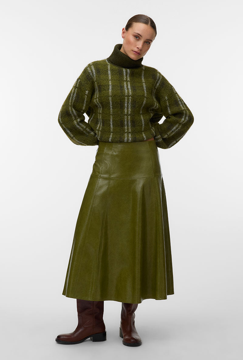 Front image of a model wearing Dash hw coated skirt in green, by brand Vero moda