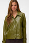 Front image of a model wearing the Dash short coated jacket in green, by brand Vero moda