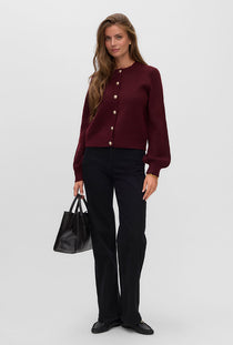 Front image of a model wearing the Hazel ls oneck cardigan in burgundy, by brand Vero moda