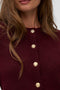 Front image of a model wearing the Hazel ls oneck cardigan in burgundy, by brand Vero moda