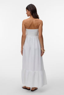 Back image of a model wearing the Lisa bandeau ankle dress in off white, by brand Vero moda