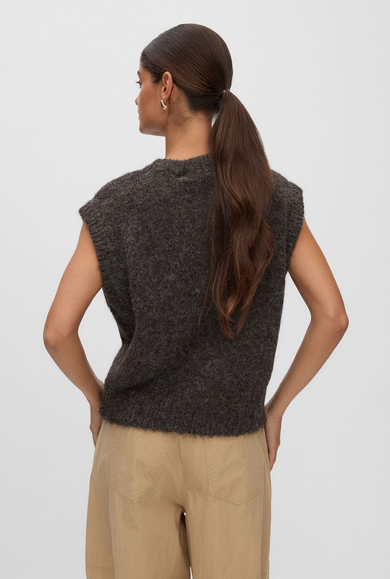 Back image of a model wearing Marianna sl oneck vest in chocolate, by brand Vero moda