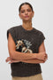 Front image of a model wearing the Marianna sl oneck vest in chocolate, by brand Vero moda