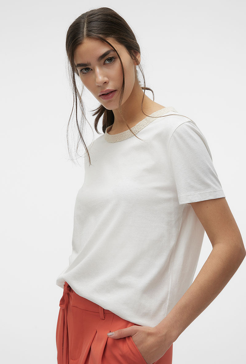 Front image of a model wearing Philipa francis ss top in off white, by brand Vero moda