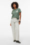 Front image of a model wearing Vanja francis ss top in green, by brand Vero moda