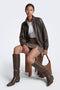 Front image of a model wearing the Violeta hw check slit skirt in brown, by brand Only