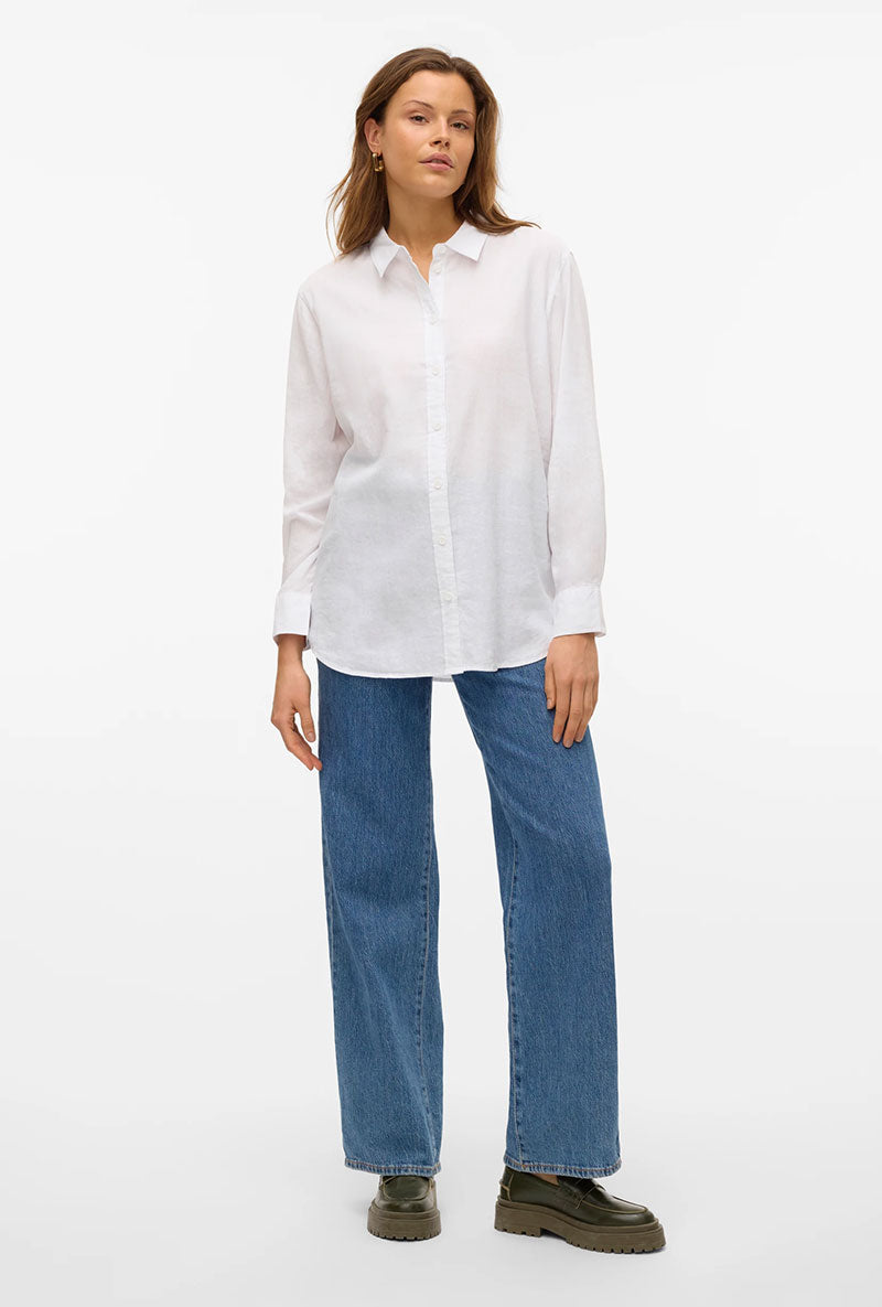 Front image of a model wearing Linn l/s vis/linen shirt in white, by brand Vero moda